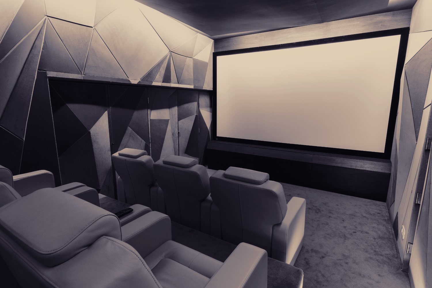 A precision-engineered private cinema with bespoke acoustic panelling